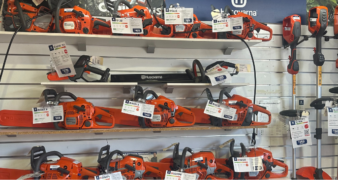 Chainsaws on wall in Husqvarna store